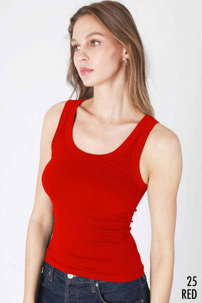 Woman wearing a red tank top.