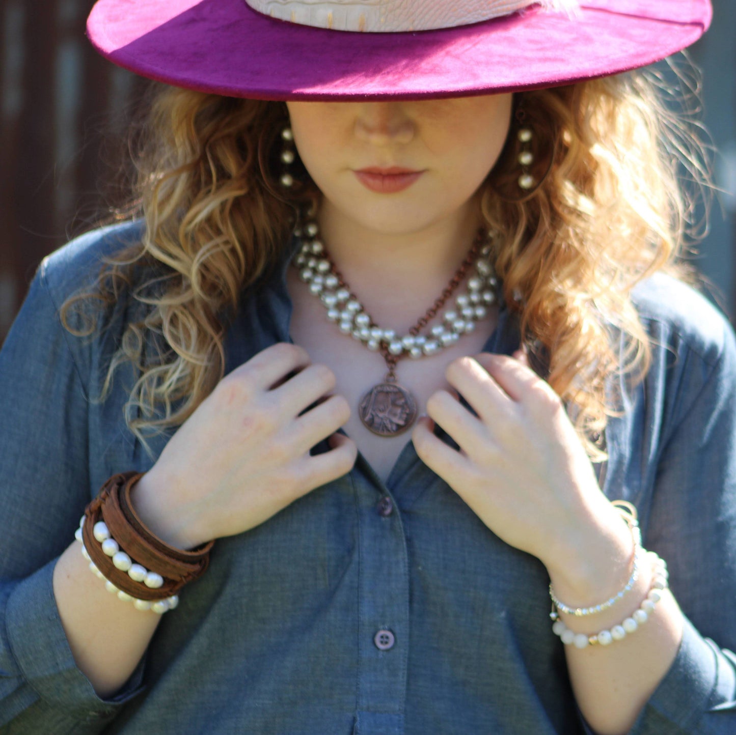 Woman in hat and jewelry