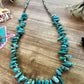 22 inch long real turquoise and shell teardrop shape blue side