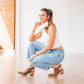 Woman in desert clay robinslingback mule shoes