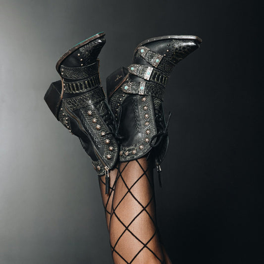 Black Showdown Rattleblack LS6 Boots on legs with fishnet stockings