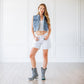 Woman in washed denim vest, Dolly Booties