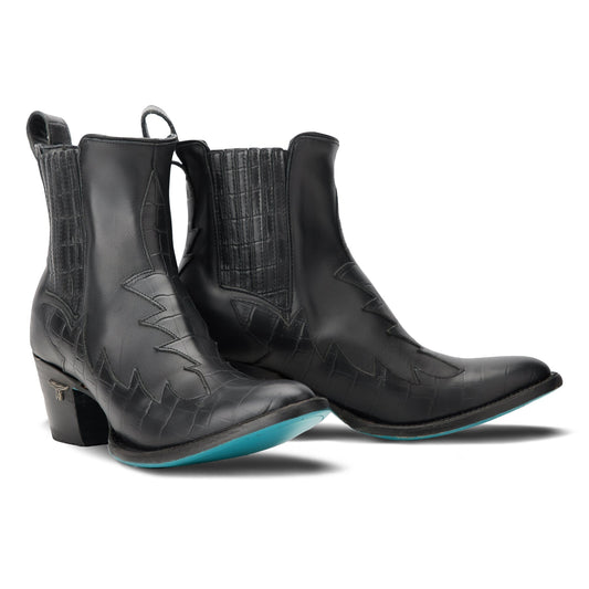 Black Western Chelsea boots with turquoise sole