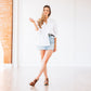 Woman in burnt caramel slingback mules