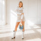 Emma Jane wearing ceramic crackle handbag and cowboy boots