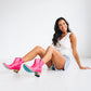 Woman wearing hot pink Emma Jane booties