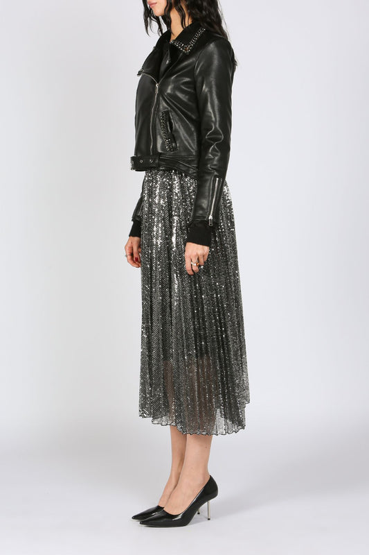 Black leather jacket and sequin skirt outfit