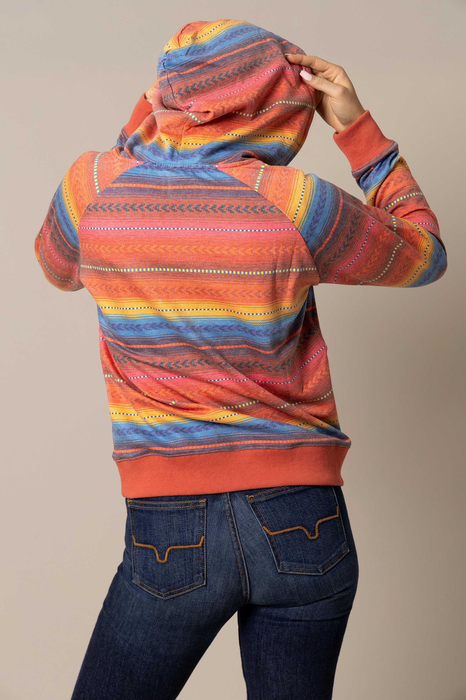 Striped hoodie with blue jeans