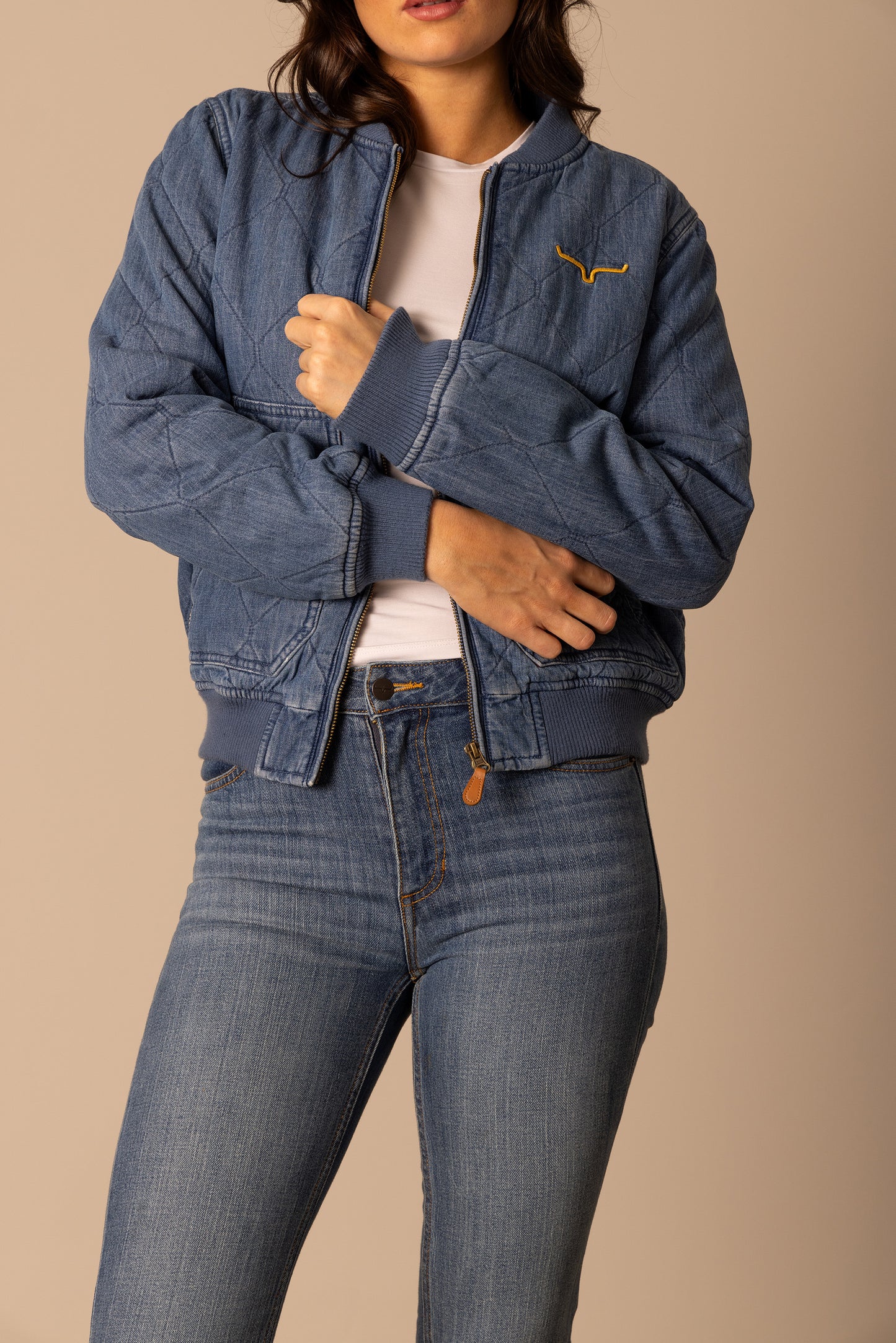 Denim bomber jacket on woman