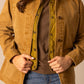 Woman in tan corduroy jacket