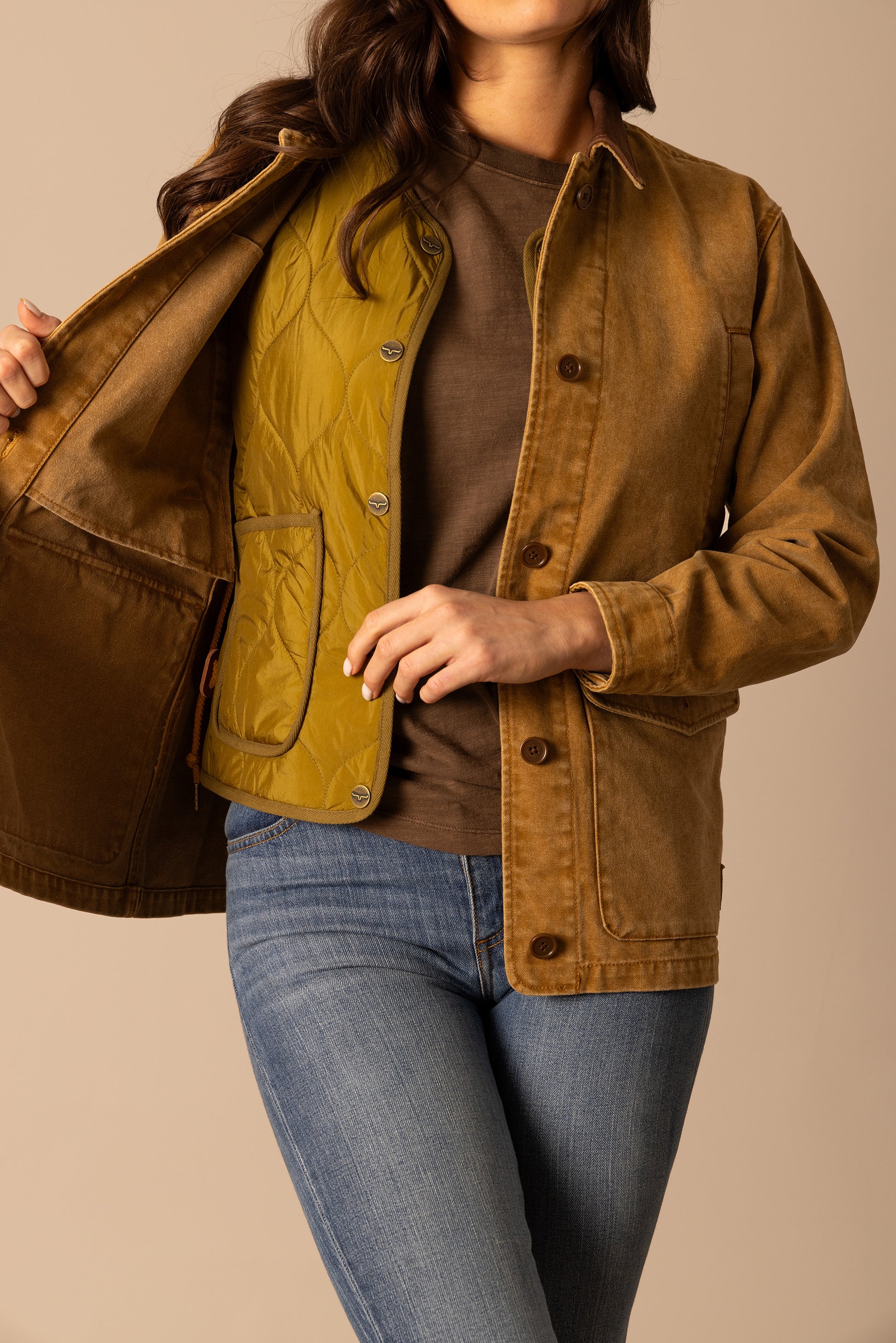Woman in brown jacket and quilted vest - unnamed-172
