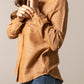 Woman in tan button-up shirt and jeans (unnamed-223)
