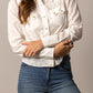 Woman in white star print shirt and jeans, unnamed-232.
