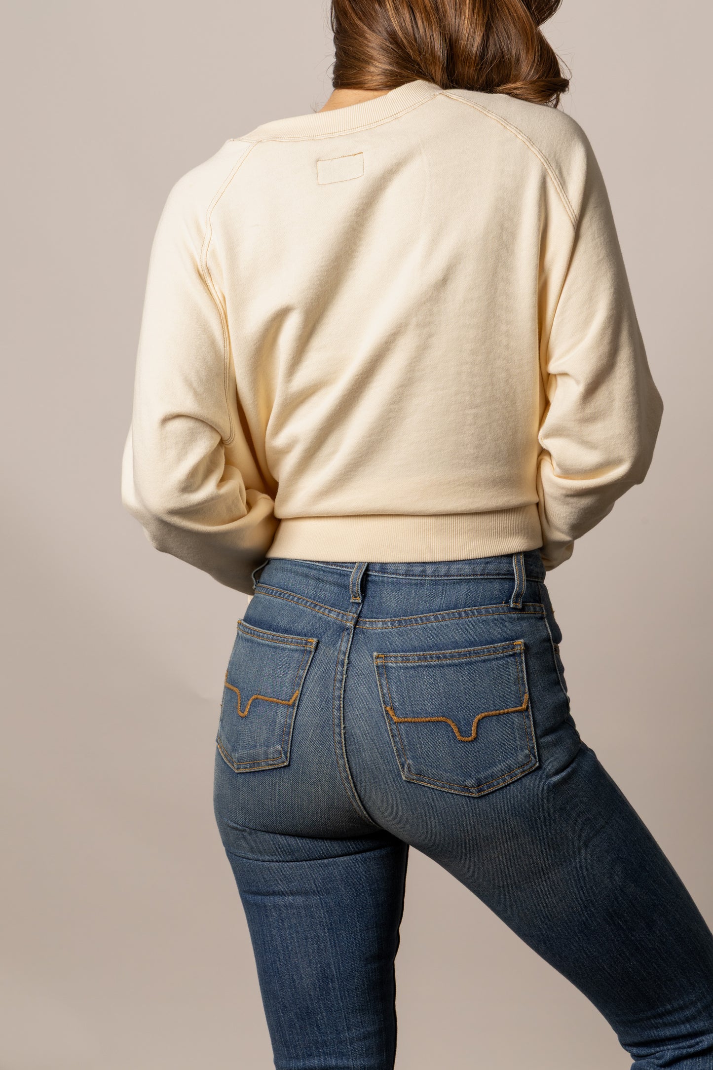 Woman in cream top and jeans, unnamed-316.