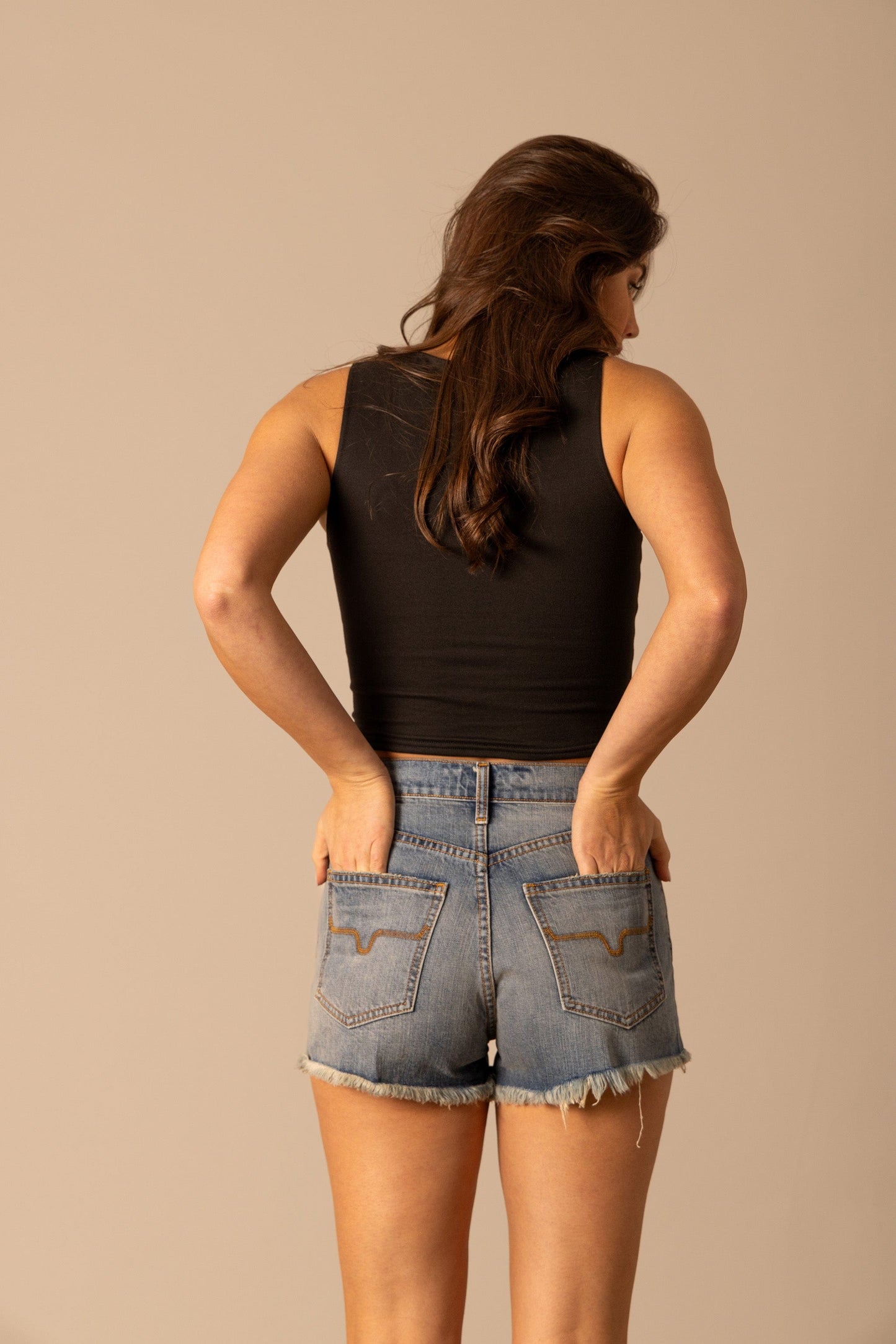 Woman in black top and denim shorts, unnamed-322